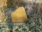  Deramy's Stone on the boundary between East and West Mersea. Its history is not clear. The plaque below the stone (erected in January 1975) says the stone marks the Boundary of the Manor of West Mersea granted by King Edward the Confessor to the Monastery of St. Ouen in 1046.
 <b>But,</b> an article by Nina Crummy in Essex Archaeology and History Vol 14. 1982, reasons that the word Deramy is a mis-translation of Old English. It concludes: Deramy never existed and the stone referred to in an old charter should lay not on Mersea Island, but four and a half miles away on the mainland.  SH010001